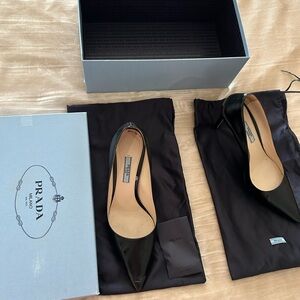 Prada pointed black heels. Size 39, shoes show wear.